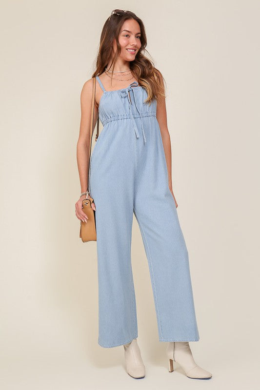 DENIM BLUE SLEEVELESS JUMPSUIT WITH SELF FRONT TIE Jumpsuits and Rompers