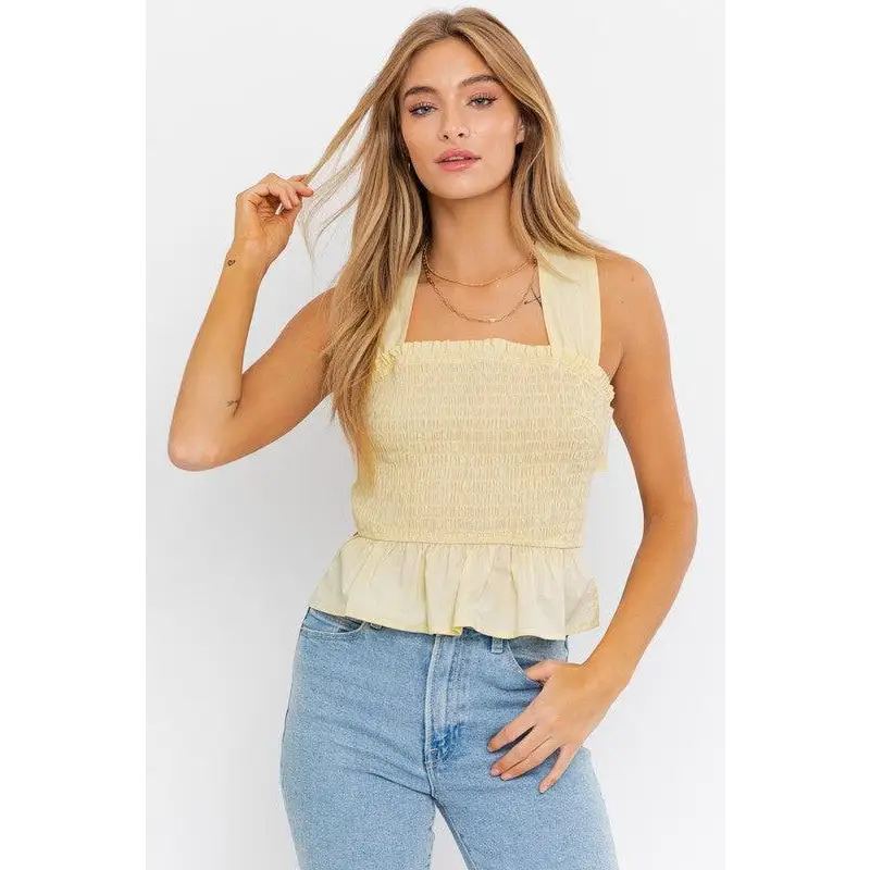 SLEEVELESS SMOCKED PEPLUM TOP LEMON Tops