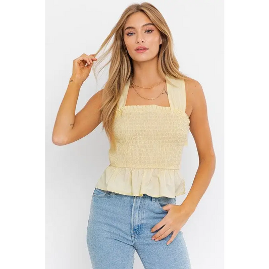 SLEEVELESS SMOCKED PEPLUM TOP LEMON Tops